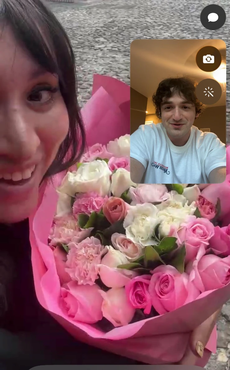 The two of us on a video call, right after the flowers arrived
